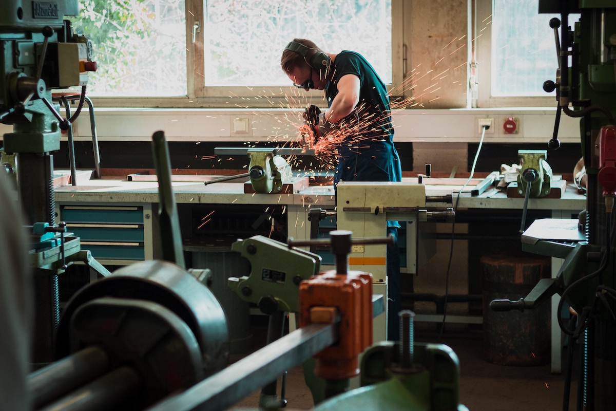 Man Uses a Circular Saw Power Tool in Workshop Salsify Tool Brand Manufacturers Winning Digital Shelf